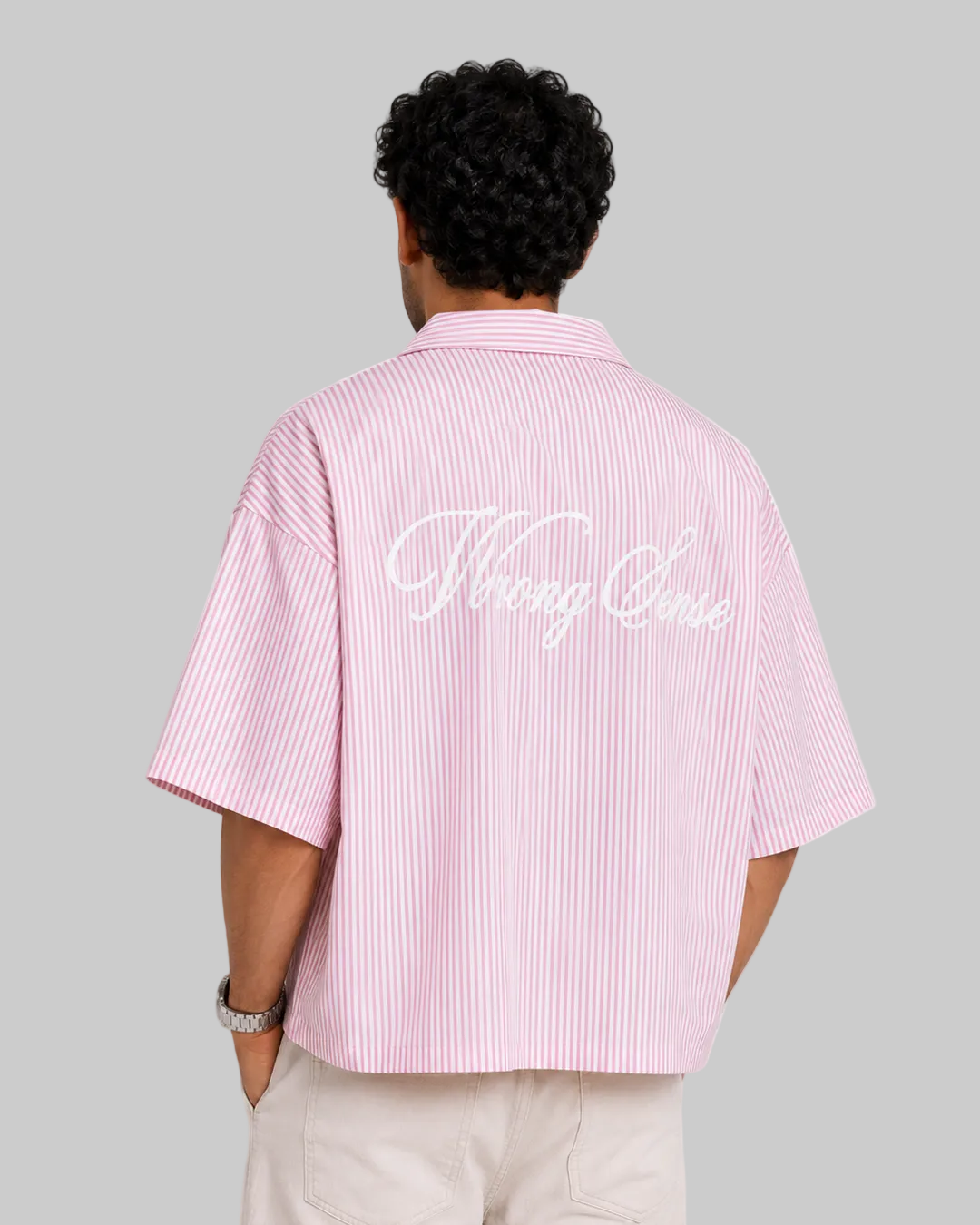 man boxy shirt pink with white stripes and  white embroidery named wrong sense